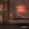 All Seeing Eye neon sign in peachy pink for spiritual decor, yoga studios, and creative wall displays.