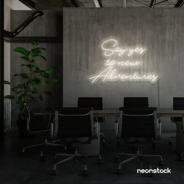 Say Yes to New Adventures neon sign in neutral white for travel decor, modern entryways, and motivational vibes.