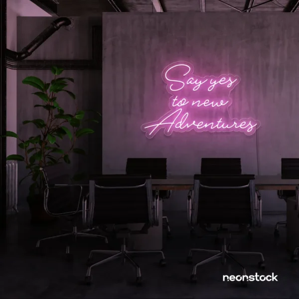 Say Yes to New Adventures neon sign in baby pink for travel decor, modern entryways, and motivational vibes.