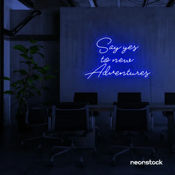 Say Yes to New Adventures neon sign in dark blue for travel decor, modern entryways, and motivational vibes.