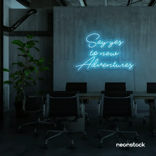 Say Yes to New Adventures neon sign in ice blue for travel decor, modern entryways, and motivational vibes.