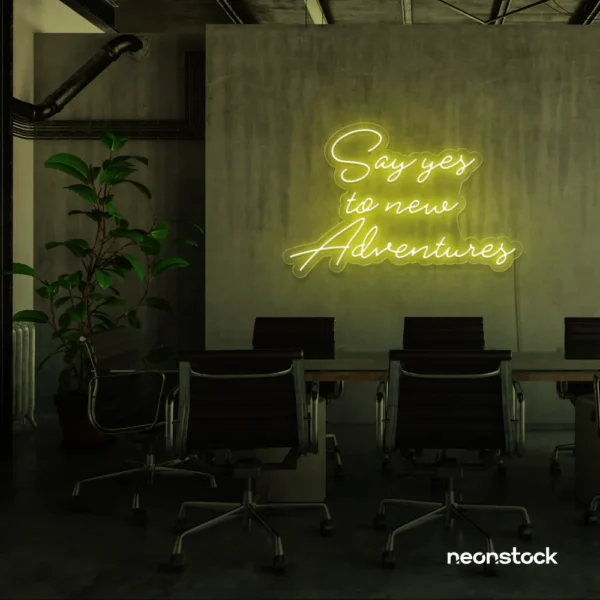 Say Yes to New Adventures neon sign in lemon yellow for travel decor, modern entryways, and motivational vibes.