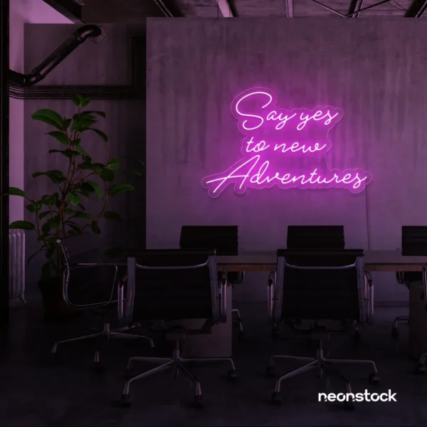 Say Yes to New Adventures neon sign in pink for travel decor, modern entryways, and motivational vibes.