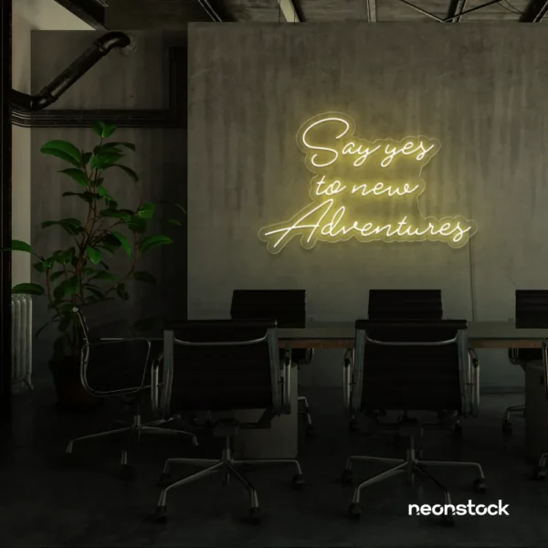 Say Yes to New Adventures neon sign in warm white for travel decor, modern entryways, and motivational vibes.