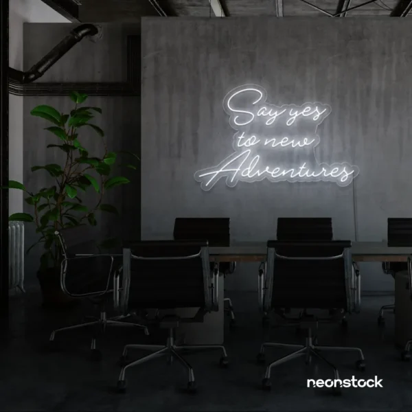 Say Yes to New Adventures neon sign in white for travel decor, modern entryways, and motivational vibes.