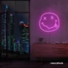 Smiley face neon sign in pink for home or kids room wall decor