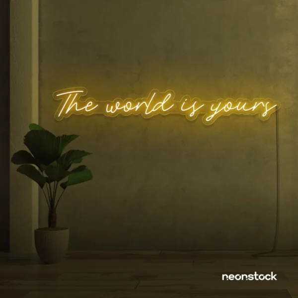 The World Is Yours neon sign in golden yellow for visionary decor, inspiring spaces, and modern walls.
