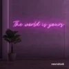 The World Is Yours neon sign in pink for visionary decor, inspiring spaces, and modern walls.