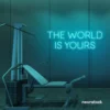 The World Is Yours neon sign in mint green for empowerment decor, teen rooms, and motivational walls.