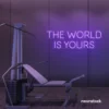 The World Is Yours neon sign in purple for empowerment decor, teen rooms, and motivational walls.