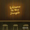 Welcome to the Jungle neon sign in golden yellow for bold interiors, gaming setups, and tropical decor.