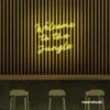 Welcome to the Jungle neon sign in lemon yellow for bold interiors, gaming setups, and tropical decor.