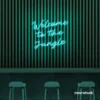 Welcome to the Jungle neon sign in mint green for bold interiors, gaming setups, and tropical decor.