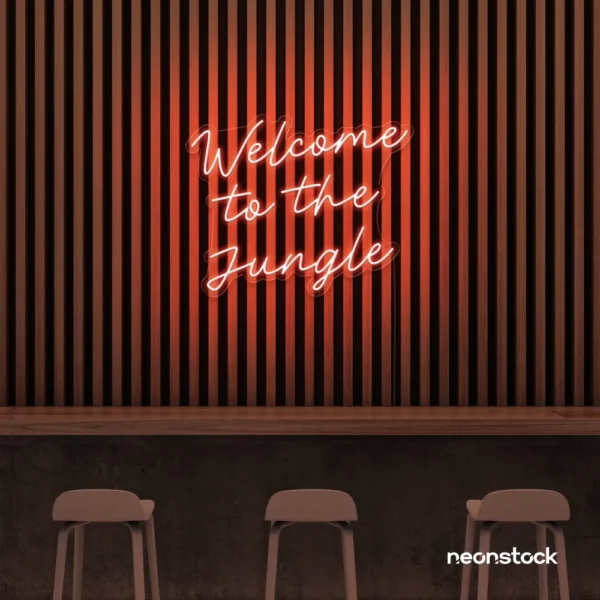 Welcome to the Jungle neon sign in peachy pink for bold interiors, gaming setups, and tropical decor.