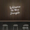Welcome to the Jungle neon sign in white for bold interiors, gaming setups, and tropical decor.