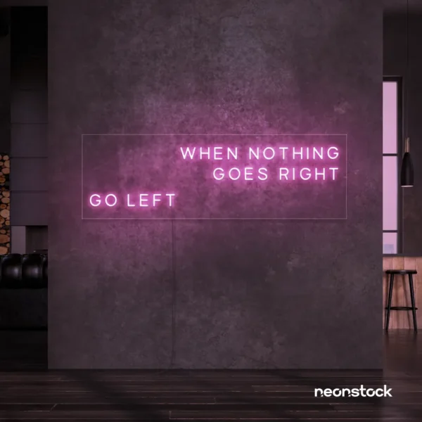 When Nothing Goes Right Go Left neon sign in baby pink for motivational spaces and creative rooms.