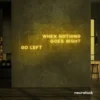 When Nothing Goes Right Go Left neon sign in golden yellow for motivational spaces and creative rooms.