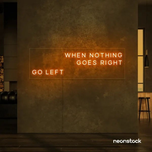 When Nothing Goes Right Go Left neon sign in orange for motivational spaces and creative rooms.