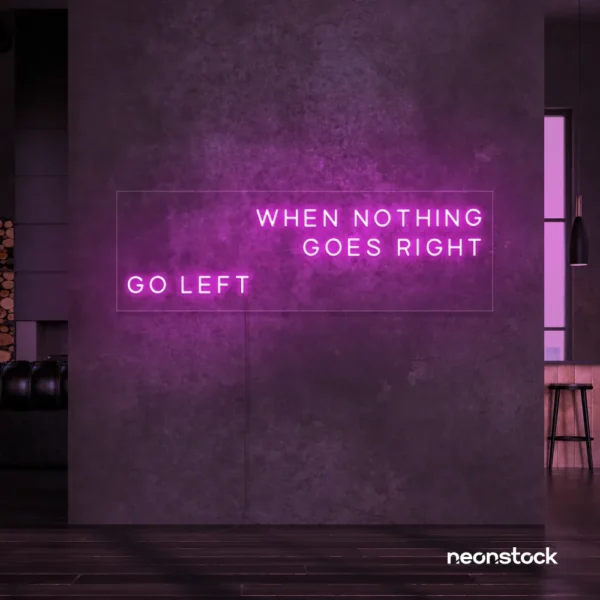 When Nothing Goes Right Go Left neon sign in pink for motivational spaces and creative rooms.