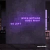 When Nothing Goes Right Go Left neon sign in purple for motivational spaces and creative rooms.
