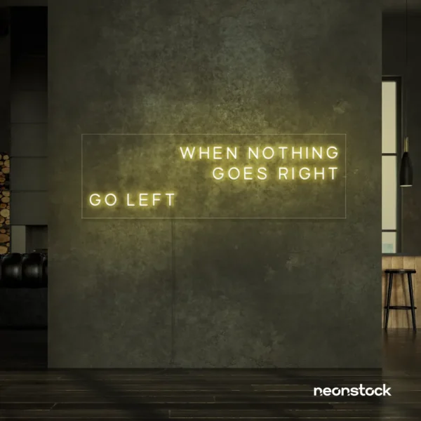 When Nothing Goes Right Go Left neon sign in warm white for motivational spaces and creative rooms.