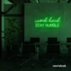 Work Hard Stay Humble neon sign in deep green for success-driven decor, workspaces, and personal growth rooms.