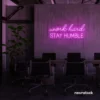 Work Hard Stay Humble neon sign in pink for success-driven decor, workspaces, and personal growth rooms.