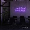 Work Hard Stay Humble neon sign in purple for success-driven decor, workspaces, and personal growth rooms.