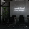 Work Hard Stay Humble neon sign in white for success-driven decor, workspaces, and personal growth rooms.