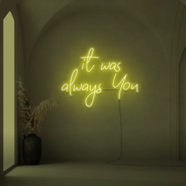 Neon sign text 'It Was Always You' in lemon yellow for weddings and romantic events