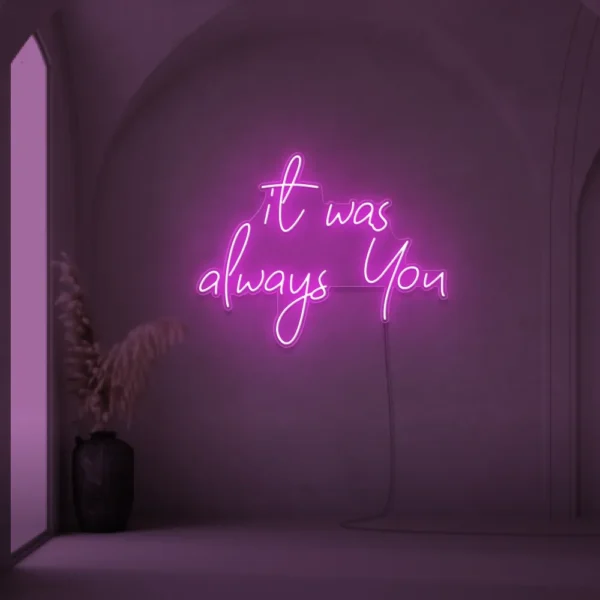 Neon sign text 'It Was Always You' in pink for weddings and romantic events