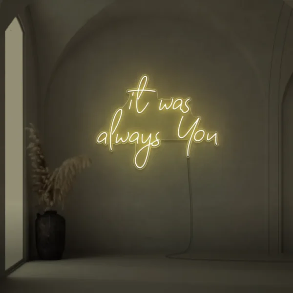 Neon sign text 'It Was Always You' in warm white for weddings and romantic events
