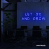 Let Go and Grow neon sign in dark blue for growth mindset decor, wellness rooms, and modern inspiration walls.