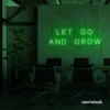 Let Go and Grow neon sign in deep green for growth mindset decor, wellness rooms, and modern inspiration walls.