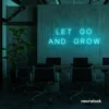 Let Go and Grow neon sign in mint green for growth mindset decor, wellness rooms, and modern inspiration walls.