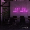 Let Go and Grow neon sign in pink for growth mindset decor, wellness rooms, and modern inspiration walls.