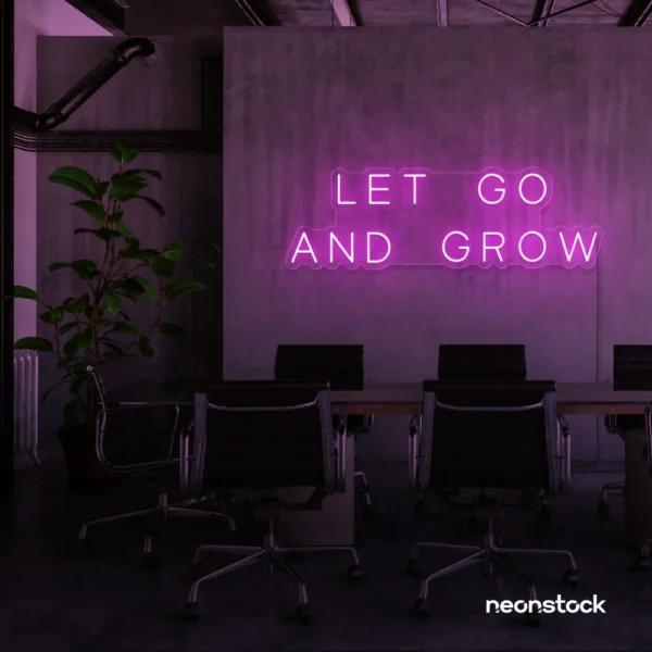 Let Go and Grow neon sign in pink for growth mindset decor, wellness rooms, and modern inspiration walls.