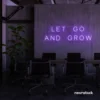Let Go and Grow neon sign in purple for growth mindset decor, wellness rooms, and modern inspiration walls.