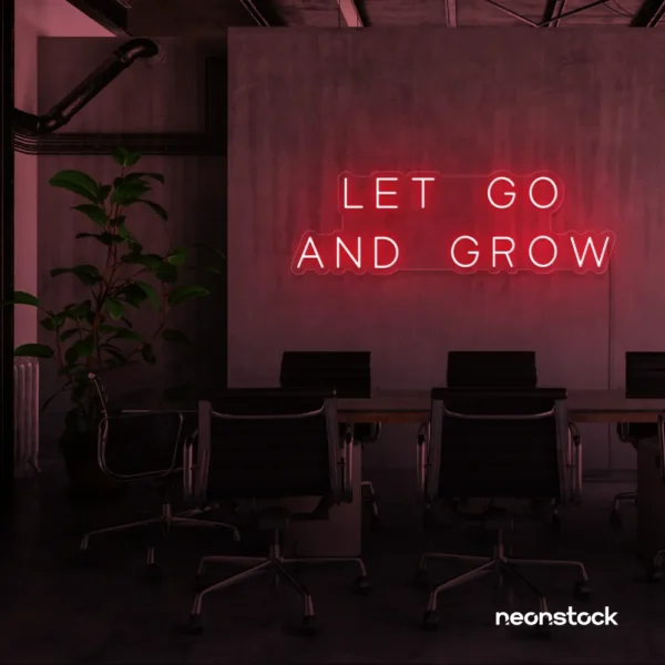 Let Go and Grow neon sign in red for growth mindset decor, wellness rooms, and modern inspiration walls.