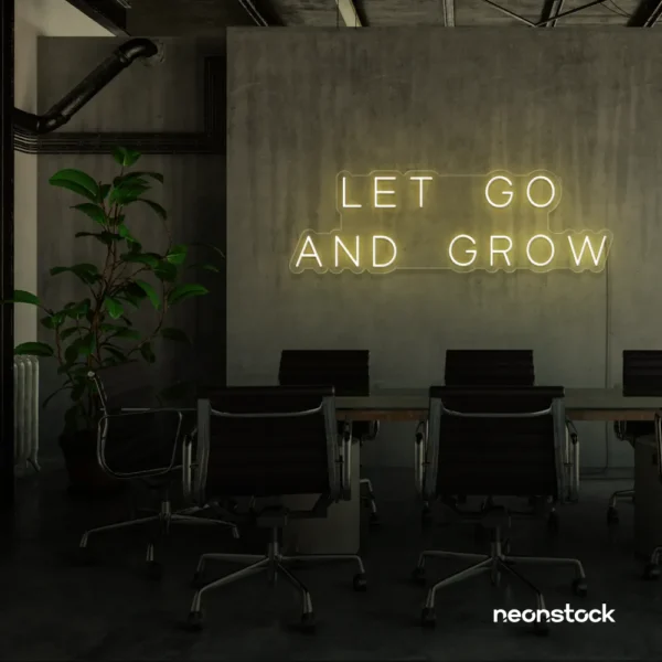 Let Go and Grow neon sign in warm white for growth mindset decor, wellness rooms, and modern inspiration walls.