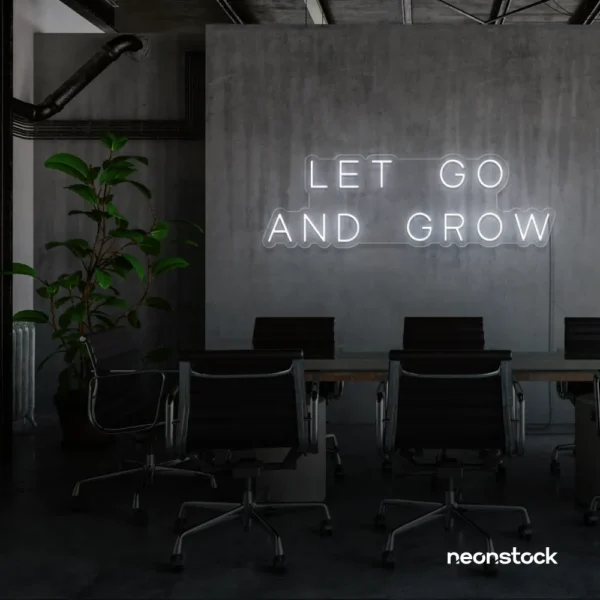 Let Go and Grow neon sign in white for growth mindset decor, wellness rooms, and modern inspiration walls.