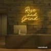 Rise and Grind neon sign in golden yellow for gym walls, hustle rooms, and motivational office decor.
