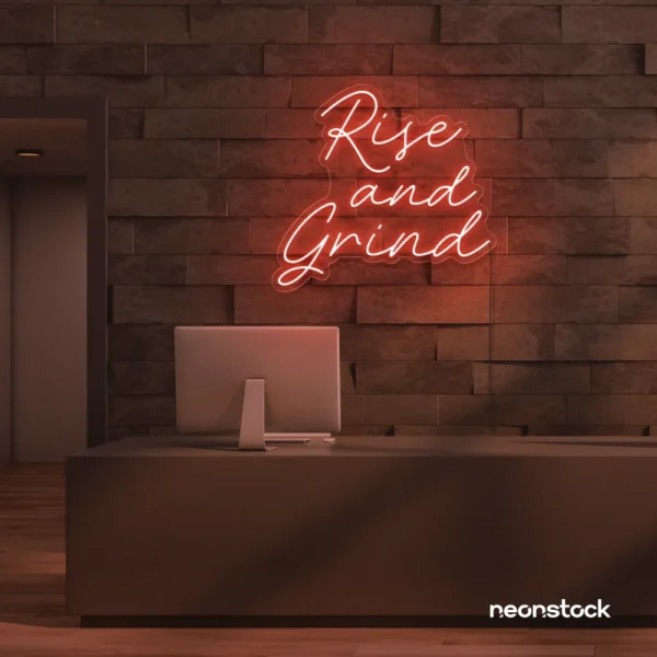 Rise and Grind neon sign in peachy pink for gym walls, hustle rooms, and motivational office decor.